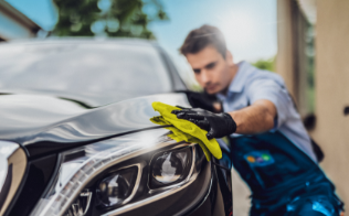 IMO car wash man cleaning car