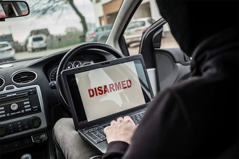 Thief trying to disarm car security