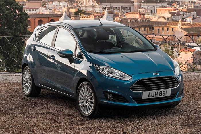 A blue Ford Fiesta parked