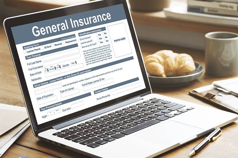 General insurance document on a laptop