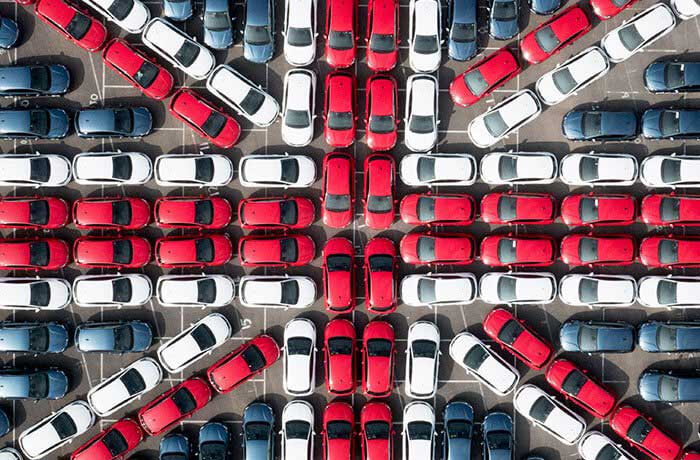 A Union Jack made up of different coloured Vauxhall Astra cars
