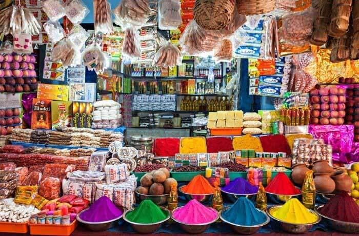 Colourful spices and goods on show outside an Indian shopfront