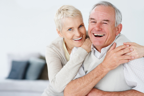 Retired elderly couple smiling