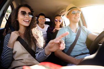 A group of young people carpooling