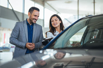 Two people buying a car