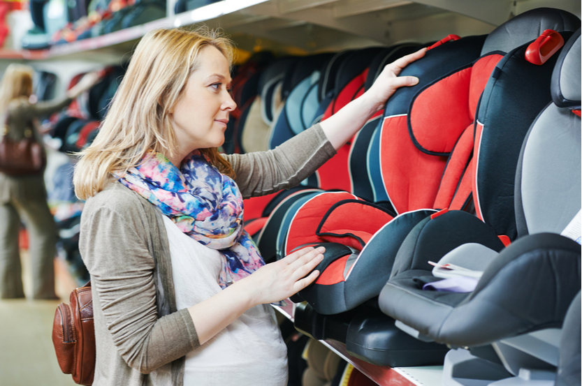 A woman picks out the right car seat for her