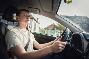 Young driver in a car