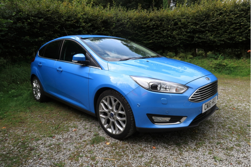 A blue Ford Focus Titanium 