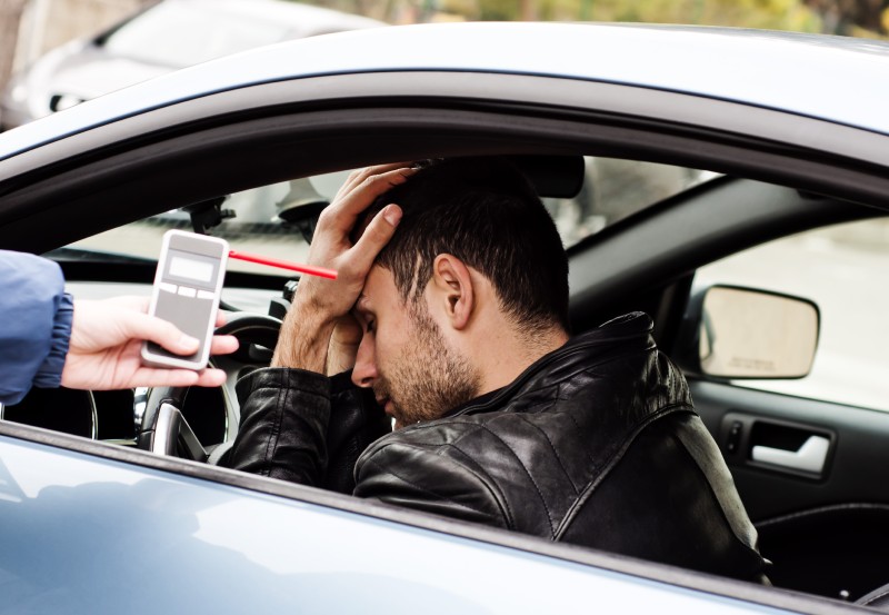 A driver is tested for drink driving