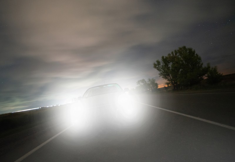 Headlight glare from a driver at night