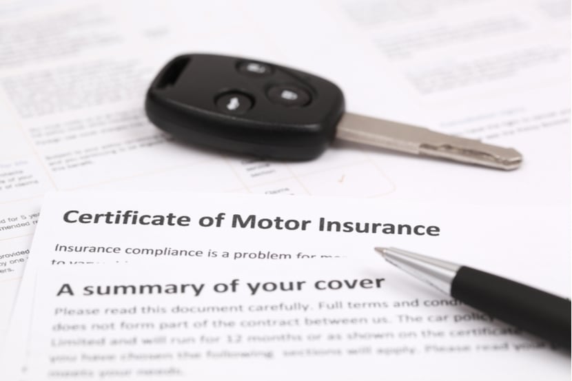A picture of car insurance documents
