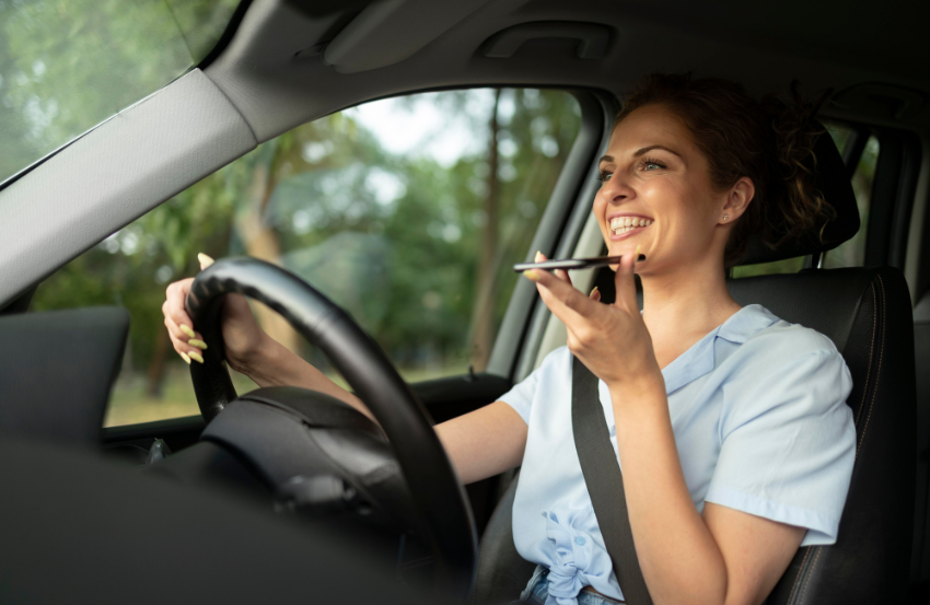 Woman driving on her phone