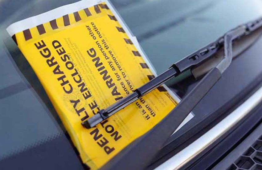 Image showing a yellow PCN ticket on a windscreen