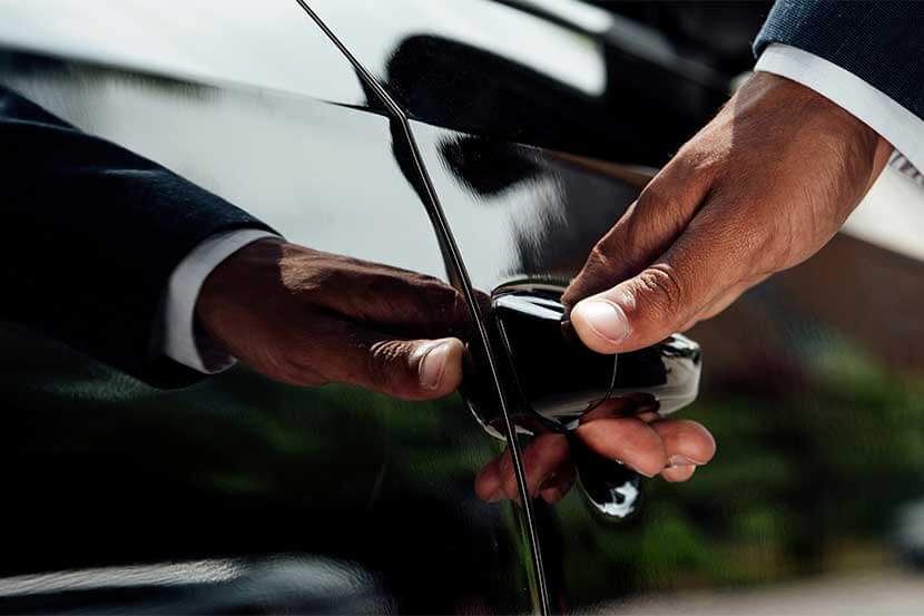 Person opening the courtesy car door