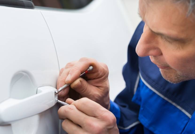 Locksmith getting into a car