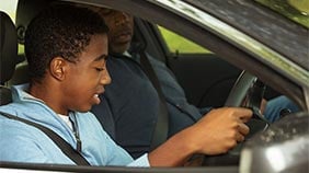Teenager learning to drive