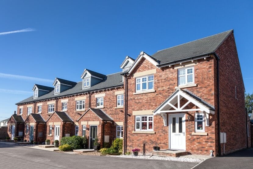 A row of mid-sized homes in the UK