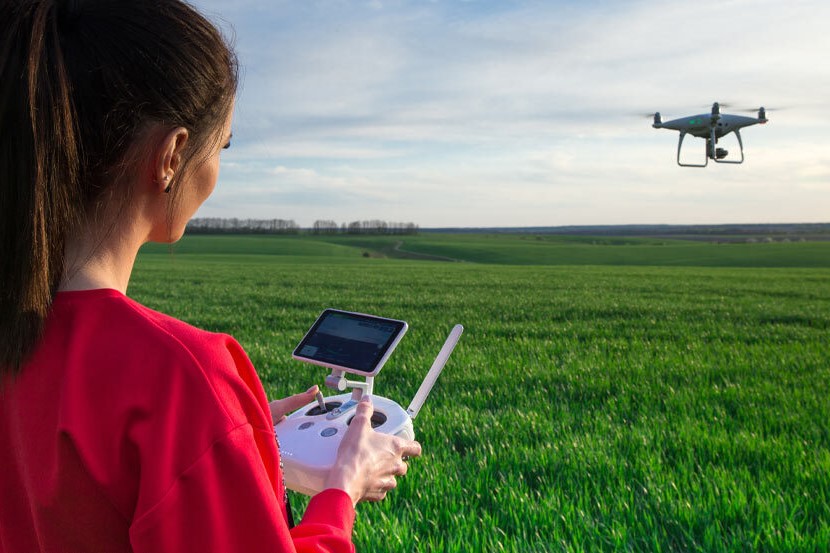 Woman piloting drone