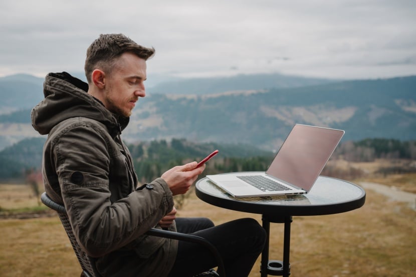man using 5g mobile outdoors