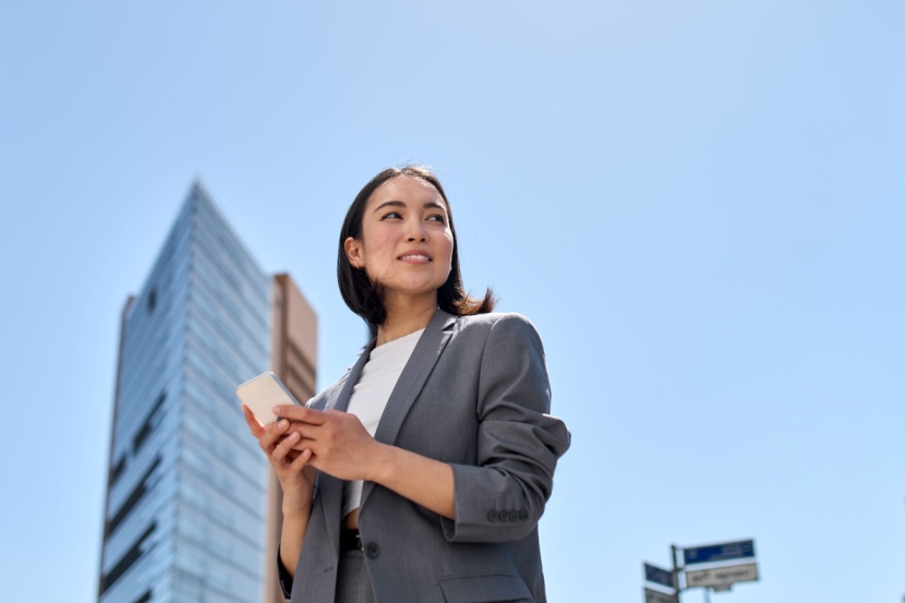 woman using mobile phone network