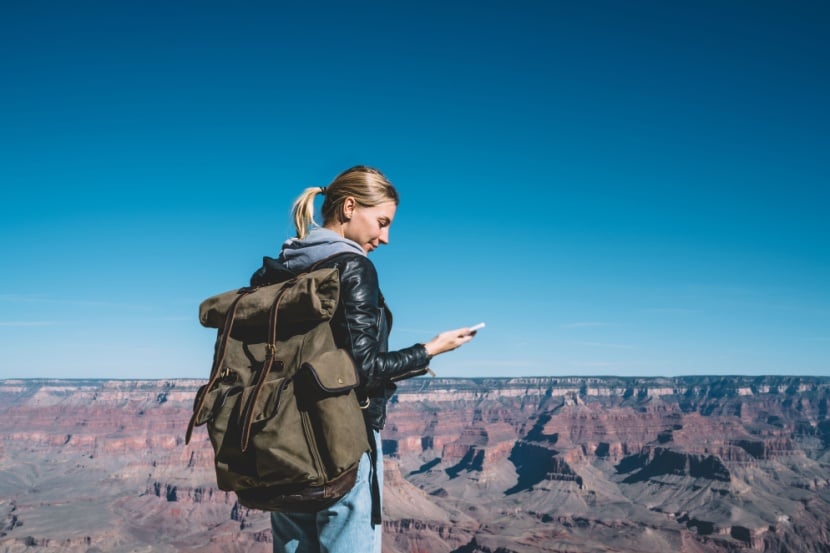 woman travelling with mobile phone