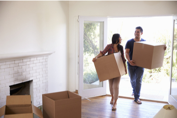 Couple moving into their new house