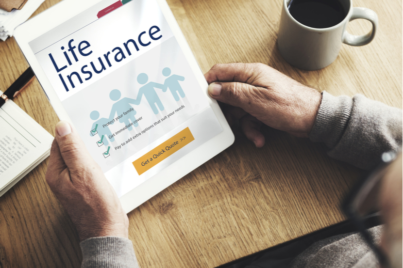 A tablet displays a life insurance website 