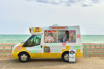 icecream van parked infront of UK beach