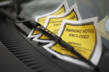 Parking tickets on a window