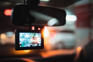 dash cam recording the road at night