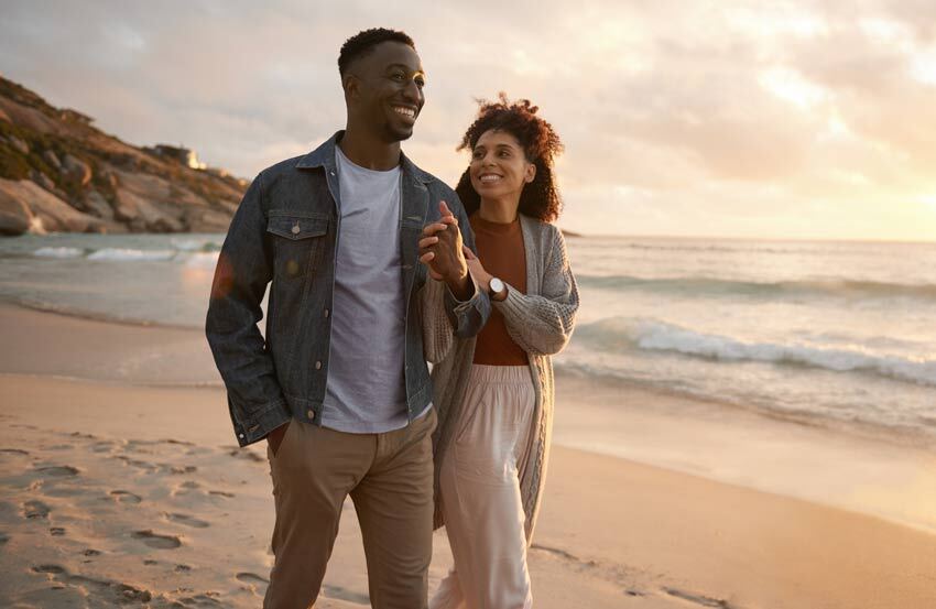 Couple walking on the beach