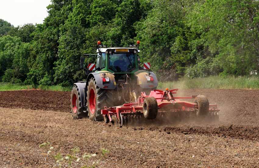 Tractor ploughing field