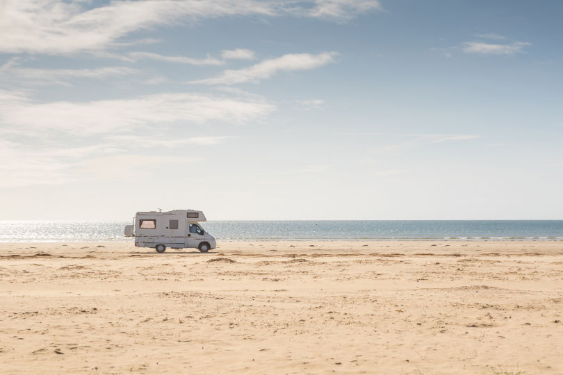 A motorhome on a beach