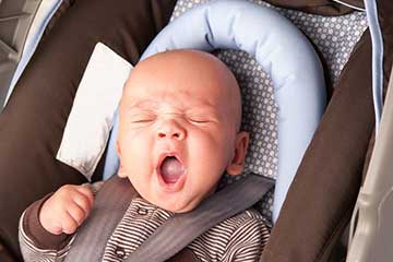 Close up of a baby yawning