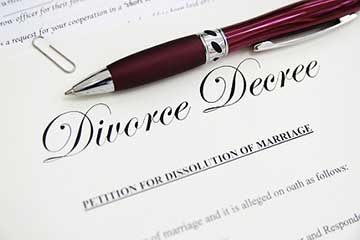 Close up of a pen on a divorce contract