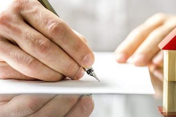 Person signing mortgage form