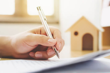 Person signing mortgage form