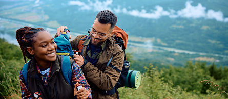 Backpackers climbing up a mountain