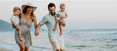 Couple on a beach holding hands