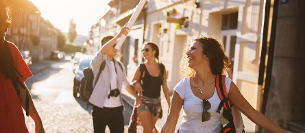 Group of people travelling through a town