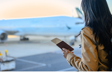 Woman getting ready to board the airplane