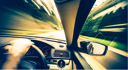 Someone driving a car