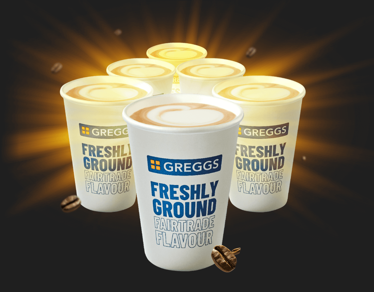 Six Greggs coffee cups glowing