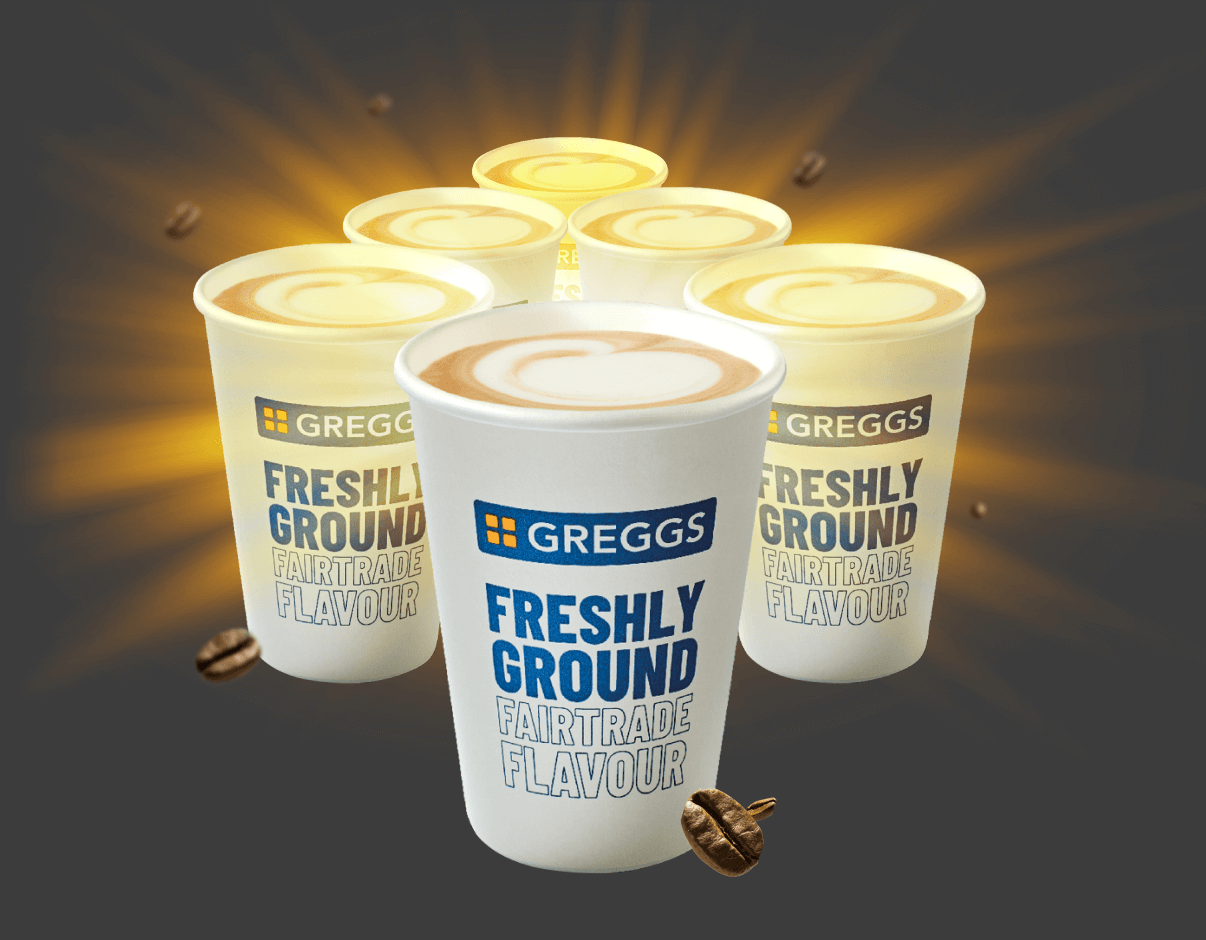 Six Greggs coffee cups glowing