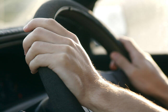Hands on the wheel