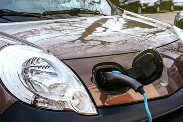 an electric van being charged